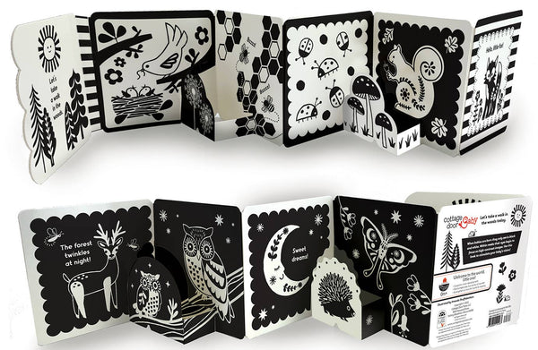 Black and white illustrated book with various animal and nature-themed designs on a white background