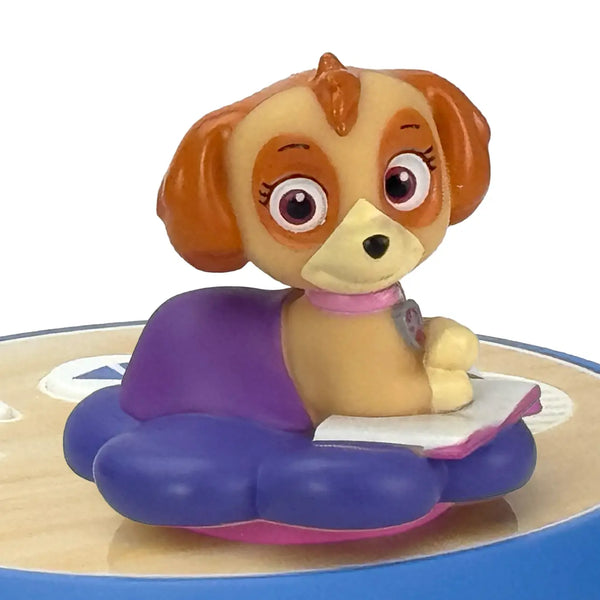 Toy figurine of a dog character on a white background