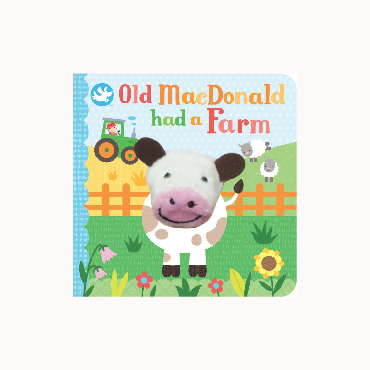A children's board book titled 'Old MacDonald had a Farm' featuring a cartoon cow on the cover, photographed against a plain light background.