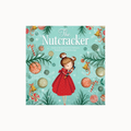 The Nutcracker children's book cover featuring an illustration of a young girl in a red dress surrounded by Christmas ornaments, candy canes, pine branches, and bells on a light teal background.