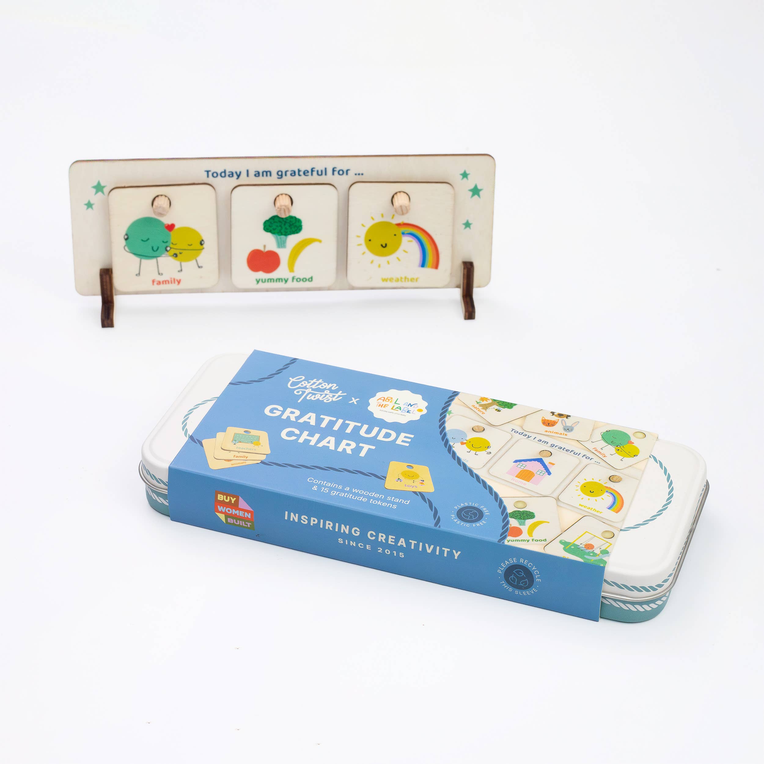 Gratitude chart with wooden stand and packaging on a white background
