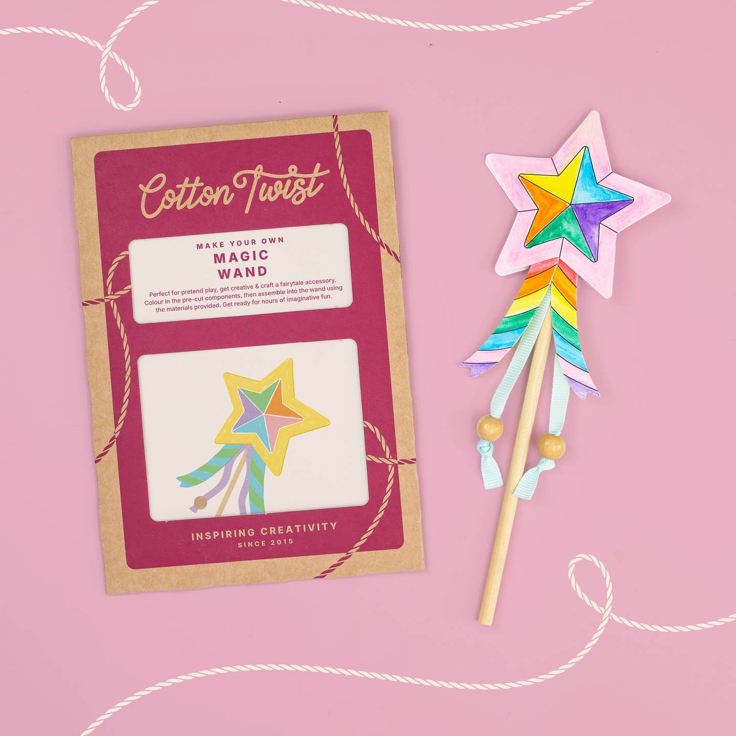 Cotton Twist magic wand kit with a colorful star-shaped wand on a pink background