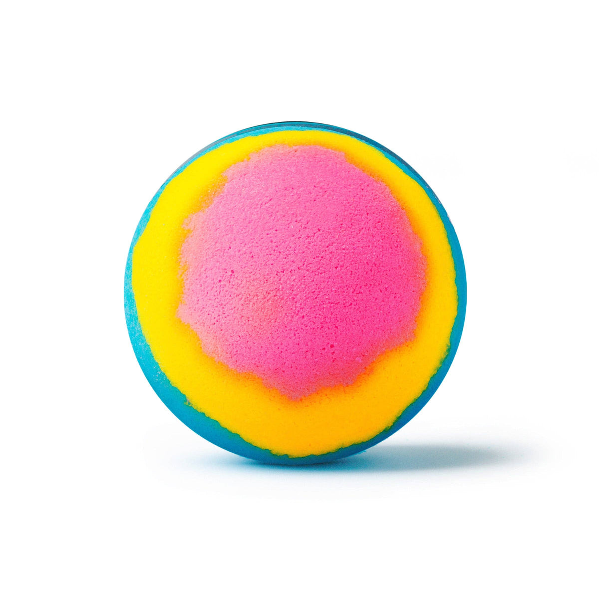 Colorful bath bomb with pink center on a white background
