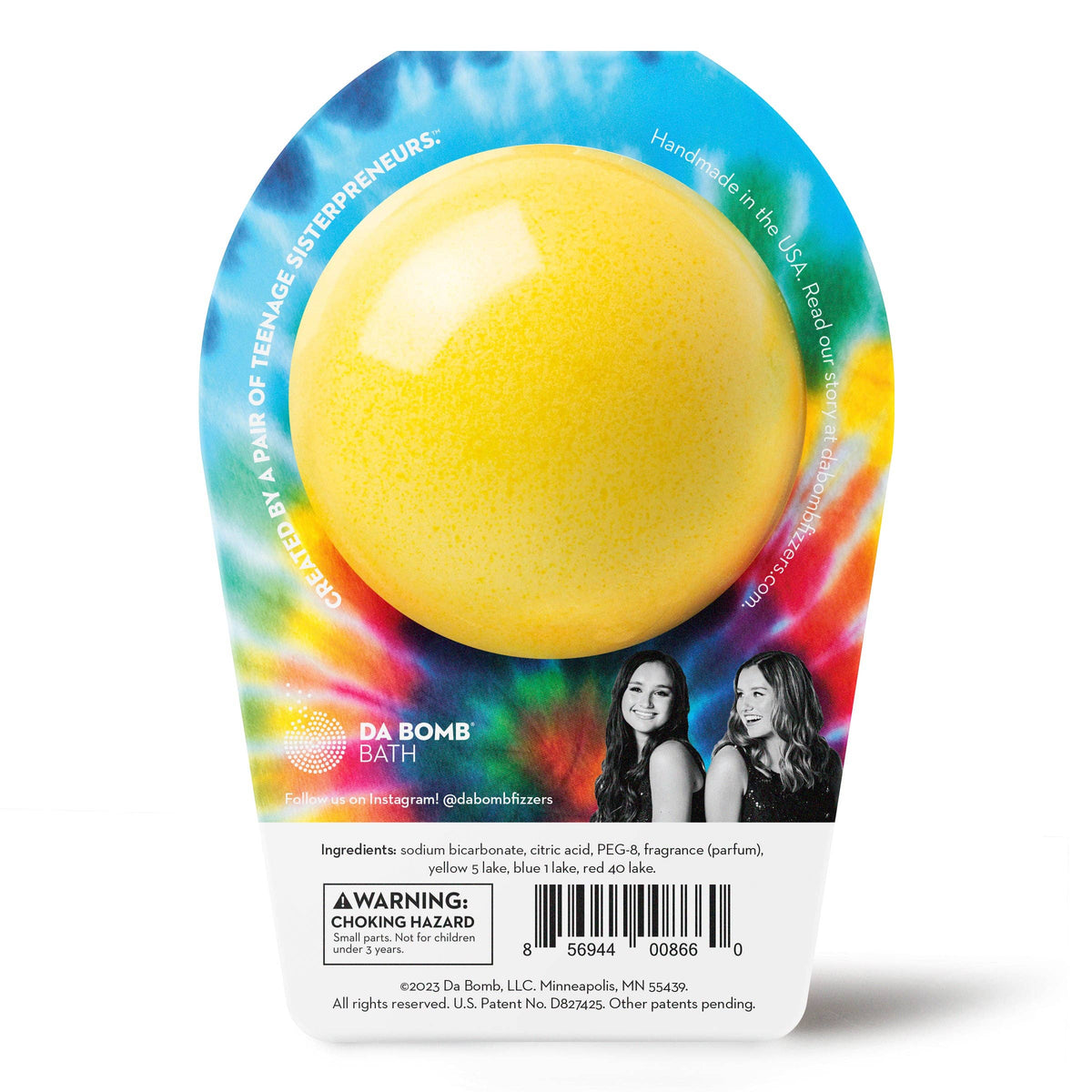 Yellow bath bomb in a colorful packaging with branding and product details.
