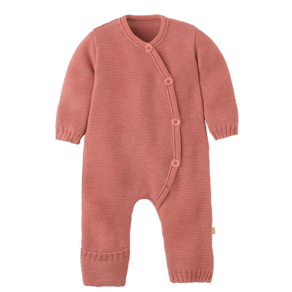 Knitted baby romper in pink on a white background