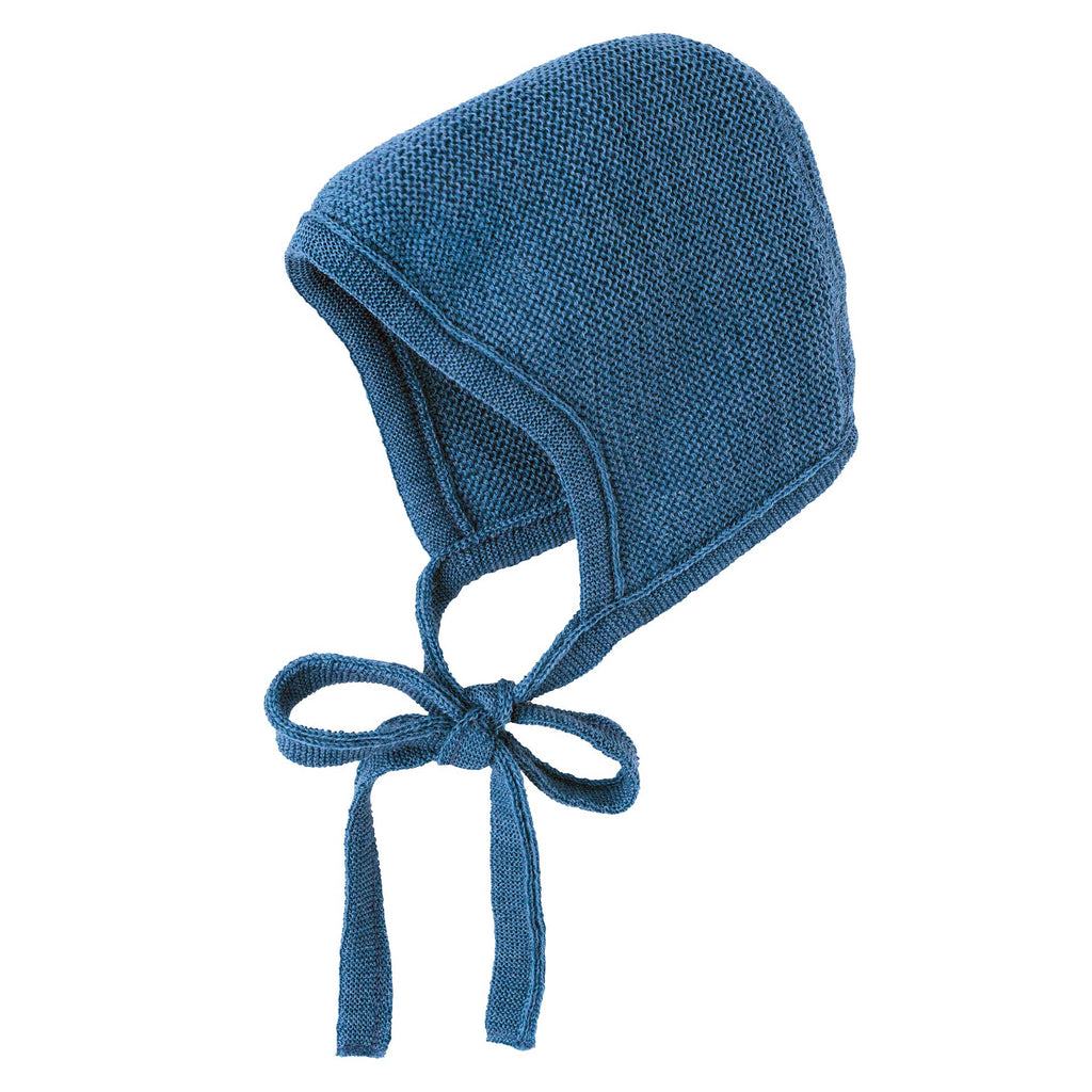 Blue knitted baby bonnet on a white background