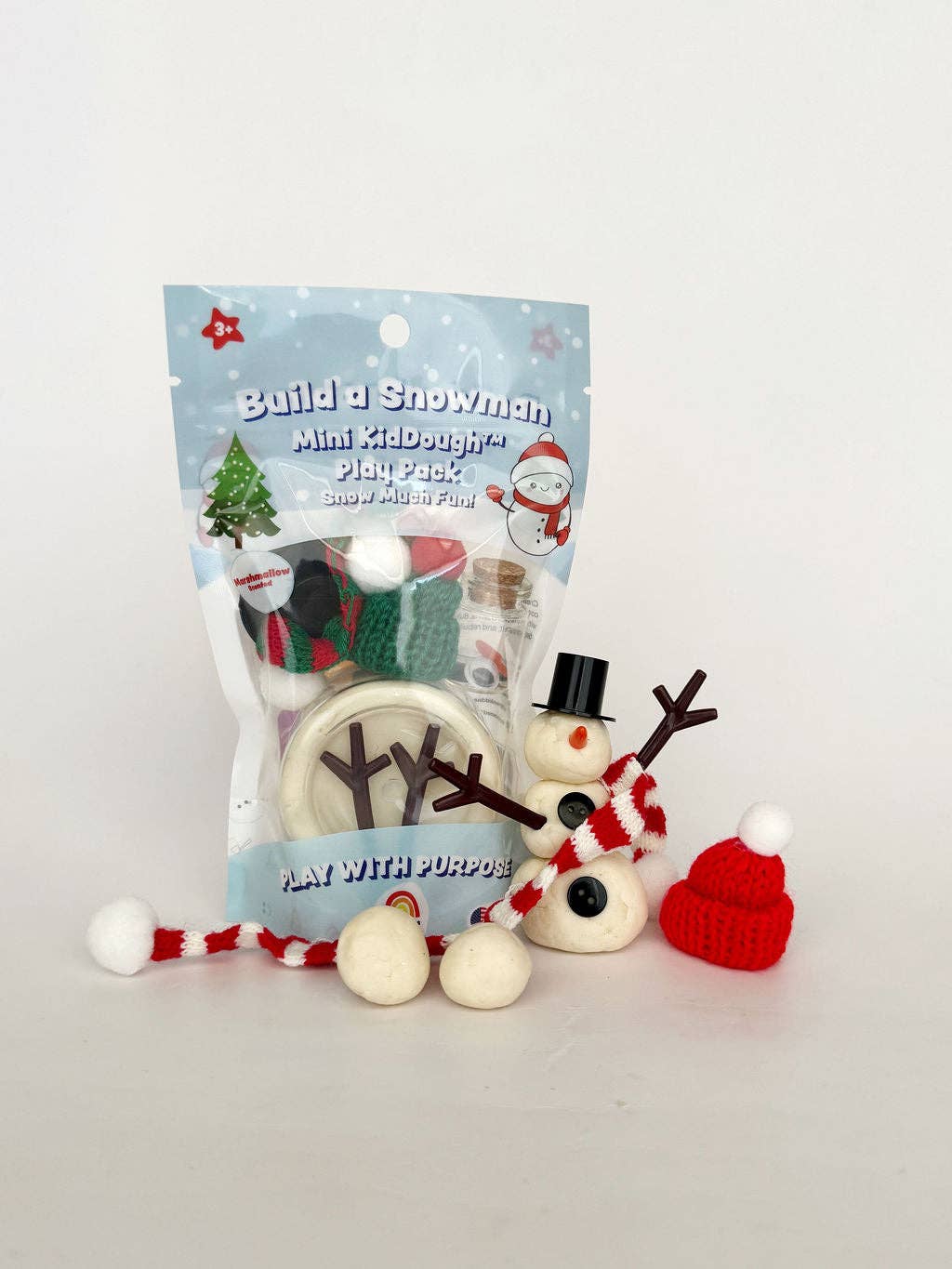 Build a Snowman play set with packaging on a light gray background