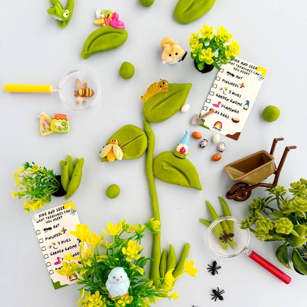 Playful garden scene with toy plants, animals, and a checklist on a white background