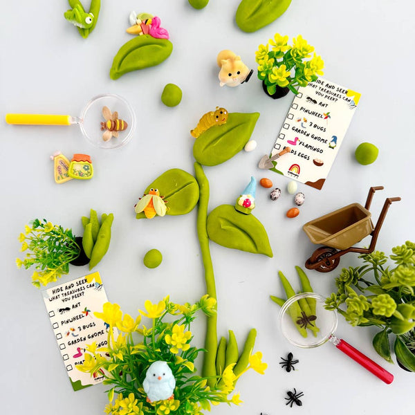 Playful garden scene with toy plants, animals, and a checklist on a white background