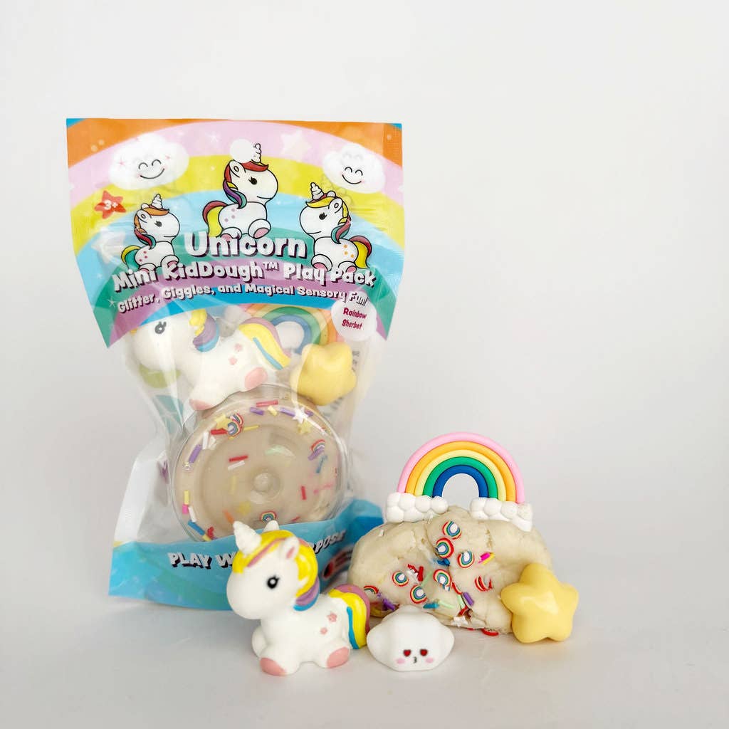 Unicorn-themed mini play dough pack with figures and packaging on a light gray background