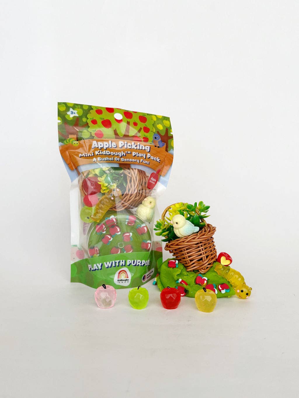 Apple picking playset with packaging on a white background