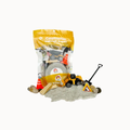 Construction-themed children's play set in a clear bag with a yellow header, shown with toy vehicles and accessories on a light gray background.