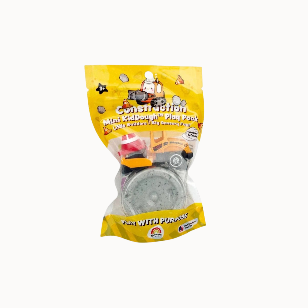 A packaged toy set in a yellow bag labeled 'Construction Mini Knapstone Play Pack' with a small gray ball and other construction-themed pieces visible through a clear window, on a plain light background.