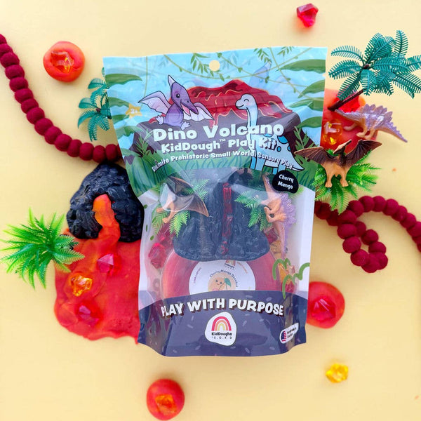 Dino Volcano KidDough Play Kit packaging with colorful play dough and volcano mold on a yellow background.