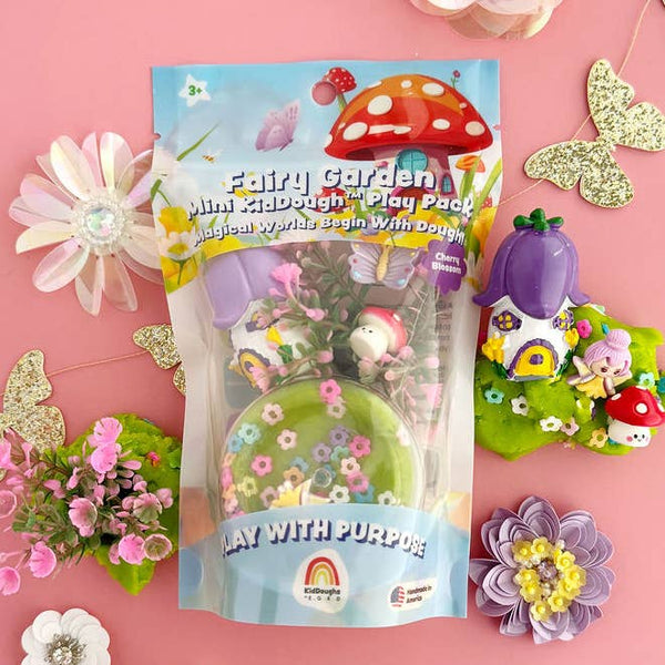 Fairy garden mini kit with packaging on a pink background