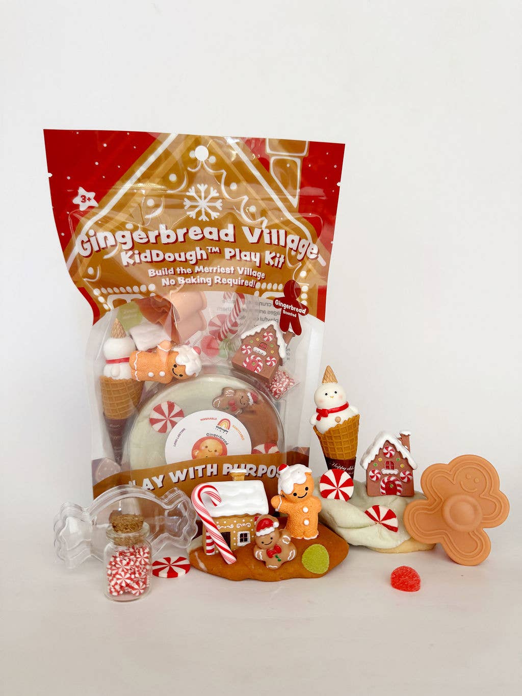 Gingerbread Village KidDough Play Kit with gingerbread-themed toys on a white background