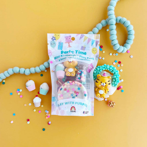 Party time-themed product packaging with toys on a yellow background