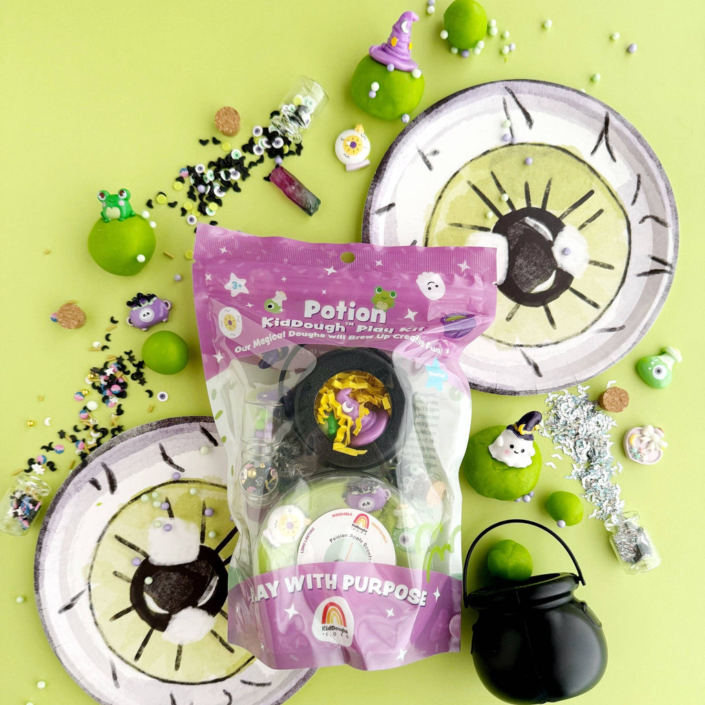 Halloween-themed product with potion bottle, cauldron, and decorative elements on a green background
