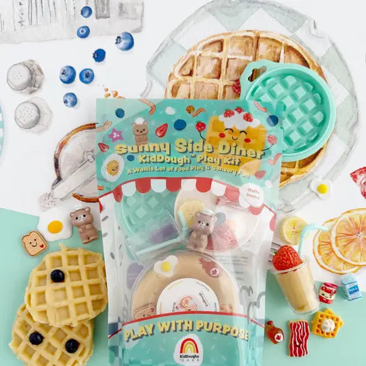 Sunny Side Diner kiddo play kit with waffle mold and play food on a light blue background