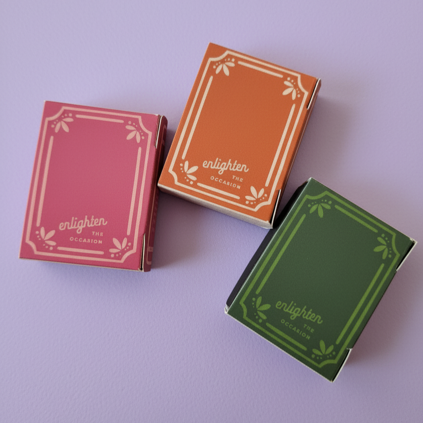 Three small boxes with 'enlighten' branding on a light purple background