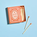 Matches with 'strike first' packaging on a light blue background