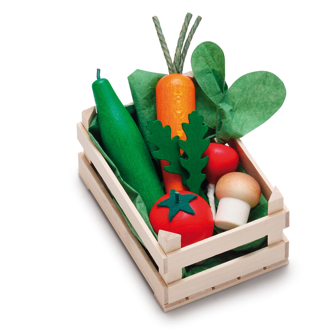 Set of toy vegetables in a wooden crate on a white background