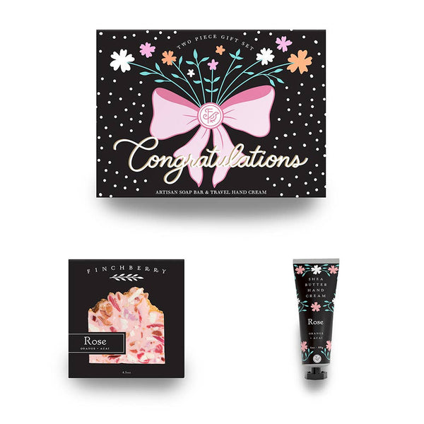 Two-piece gift set with 'Congratulations' packaging, soap bar, and hand cream on a white background