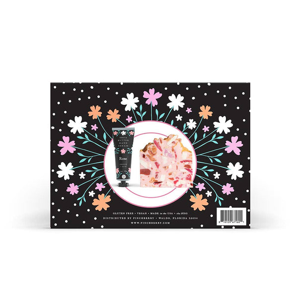 Product packaging with floral design and a visible brand logo on a black background