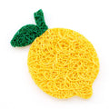 Yellow lemon-shaped sponge with a green handle on a white background