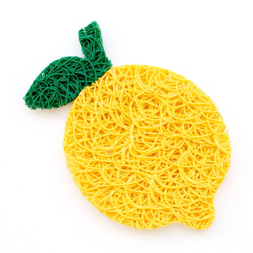 Yellow lemon-shaped sponge with a green handle on a white background