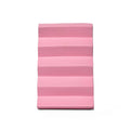 Pink striped mat on a white background