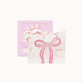 A pink Finchberry gift box with a matching decorative card in front, featuring a pink bow illustration and a small pig illustration, on a plain white background.