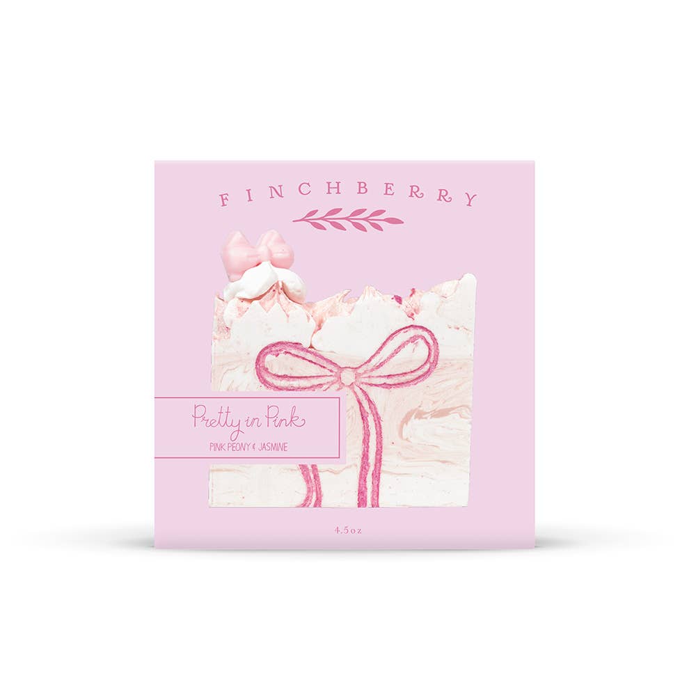 Pink packaging of Finchberry with a bow design on a white background