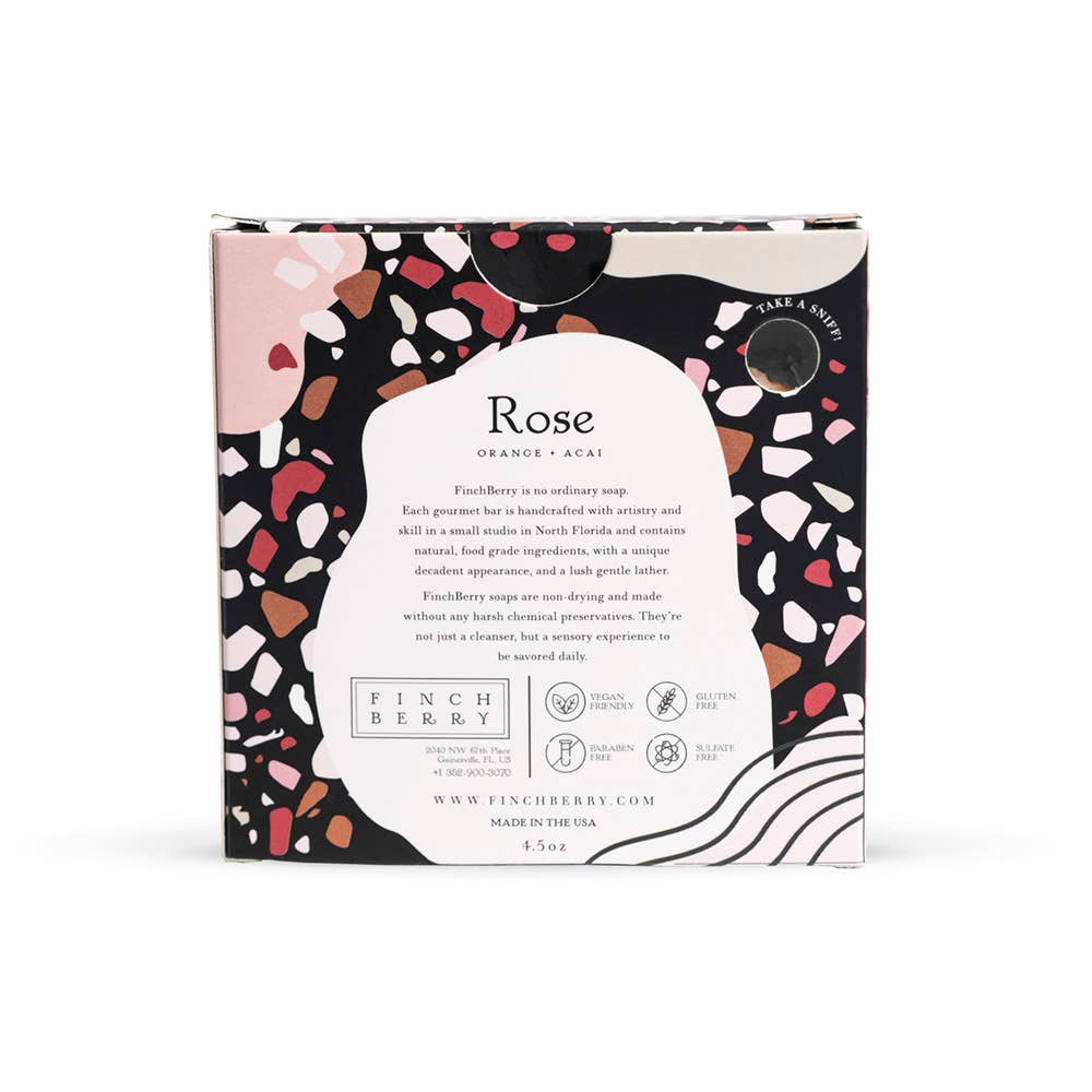 Packaged soap with decorative design and text on a white background