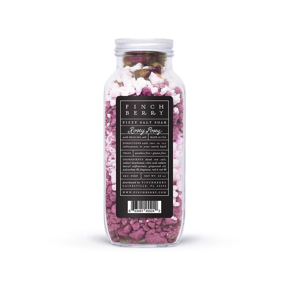 Jar of pink bath salts with a label on a white background