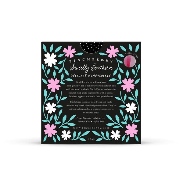 Finchberry product packaging with floral design on a white background