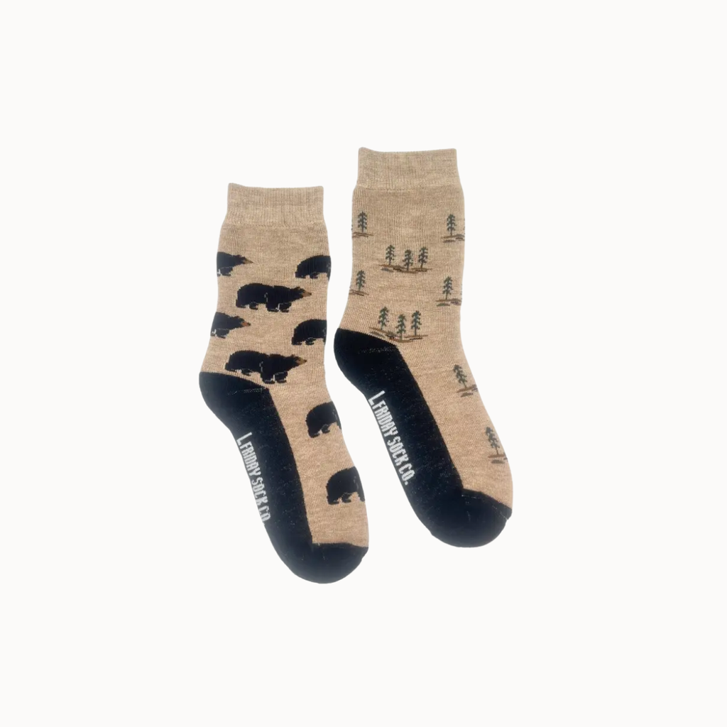 A pair of socks with bear and tree pattern on a white background