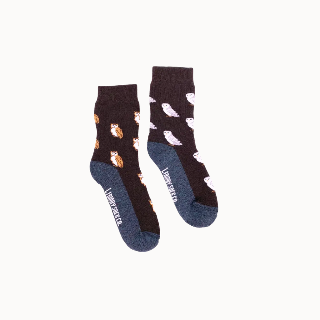 Pair of socks with owl pattern and Lumberjack branding on white background