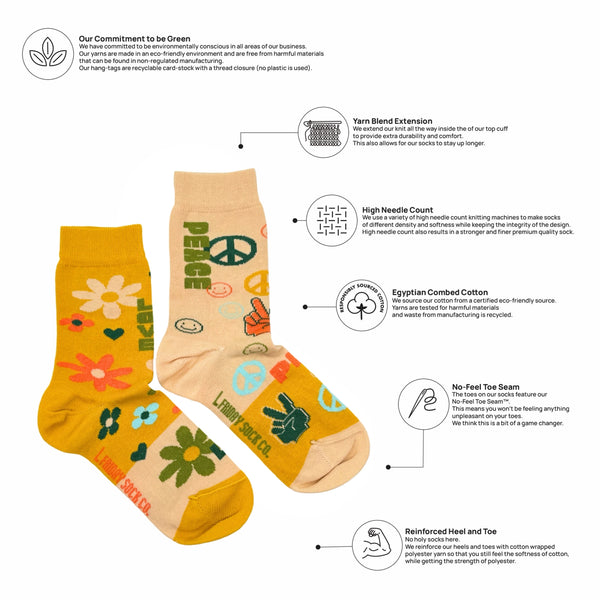 Two pairs of socks with peace sign designs on a white background with greenery graphics.