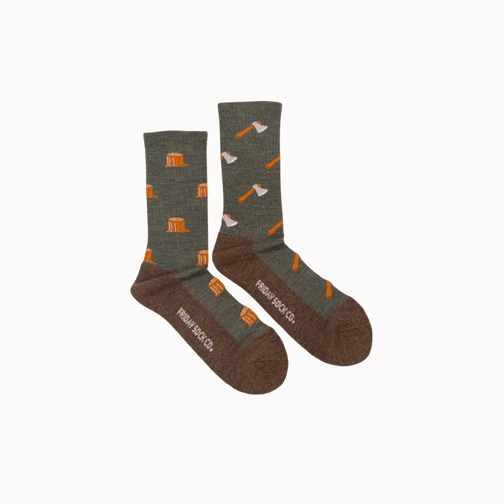 Pair of mens socks with log and axe patterns on a white background