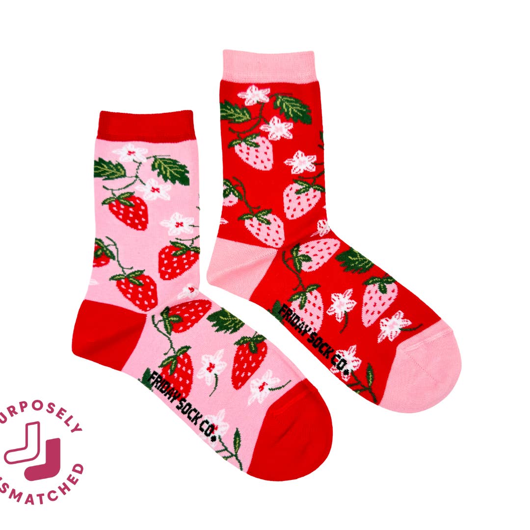 Two socks with strawberry pattern on a white background, featuring the brand 'Surprisingly Smatched'.