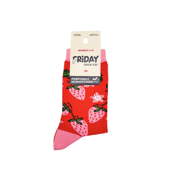 Red sock with strawberry pattern and 'Friday Sock Co.' packaging on a white background