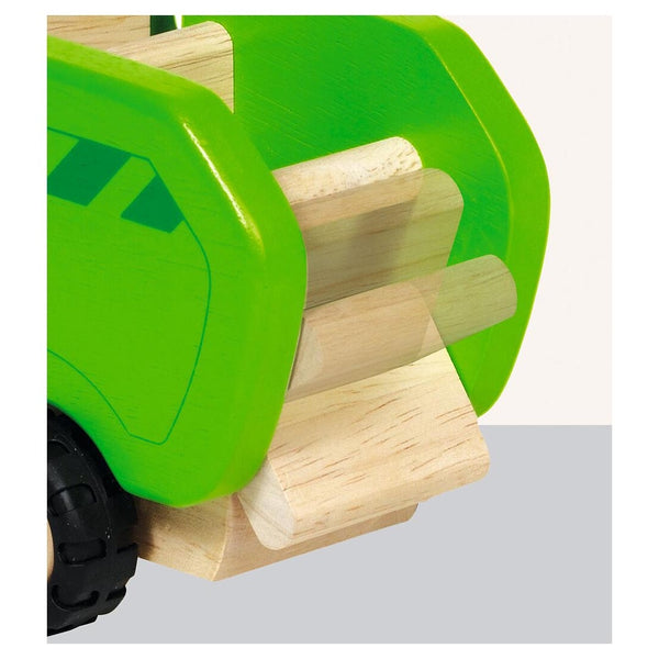 Close-up of a wooden toy truck with green wheels on a white background