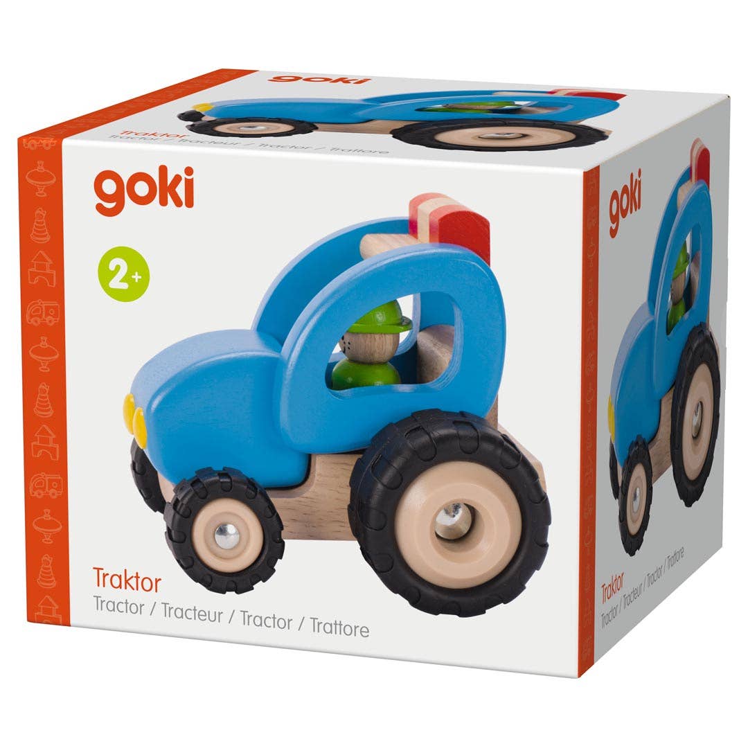 Goki wooden toy tractor packaging on a white background
