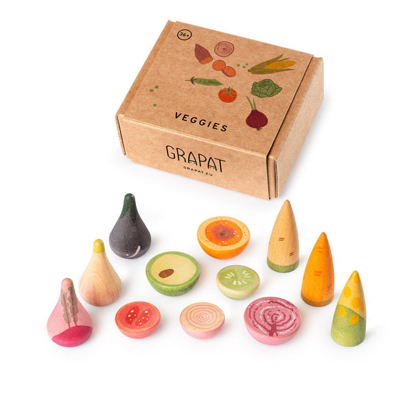 Set of wooden toy vegetables with a Grapat box on a white background