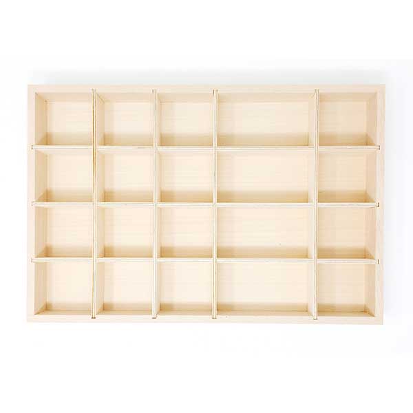 Wooden storage unit with multiple compartments on a white background