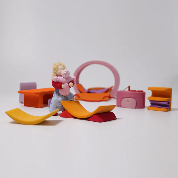 Colorful toy furniture set on a white background