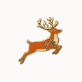 A festive enamel lapel pin depicting a leaping brown deer with gold antlers and harness, accented with green holly leaves and red berries, set against a plain white background.