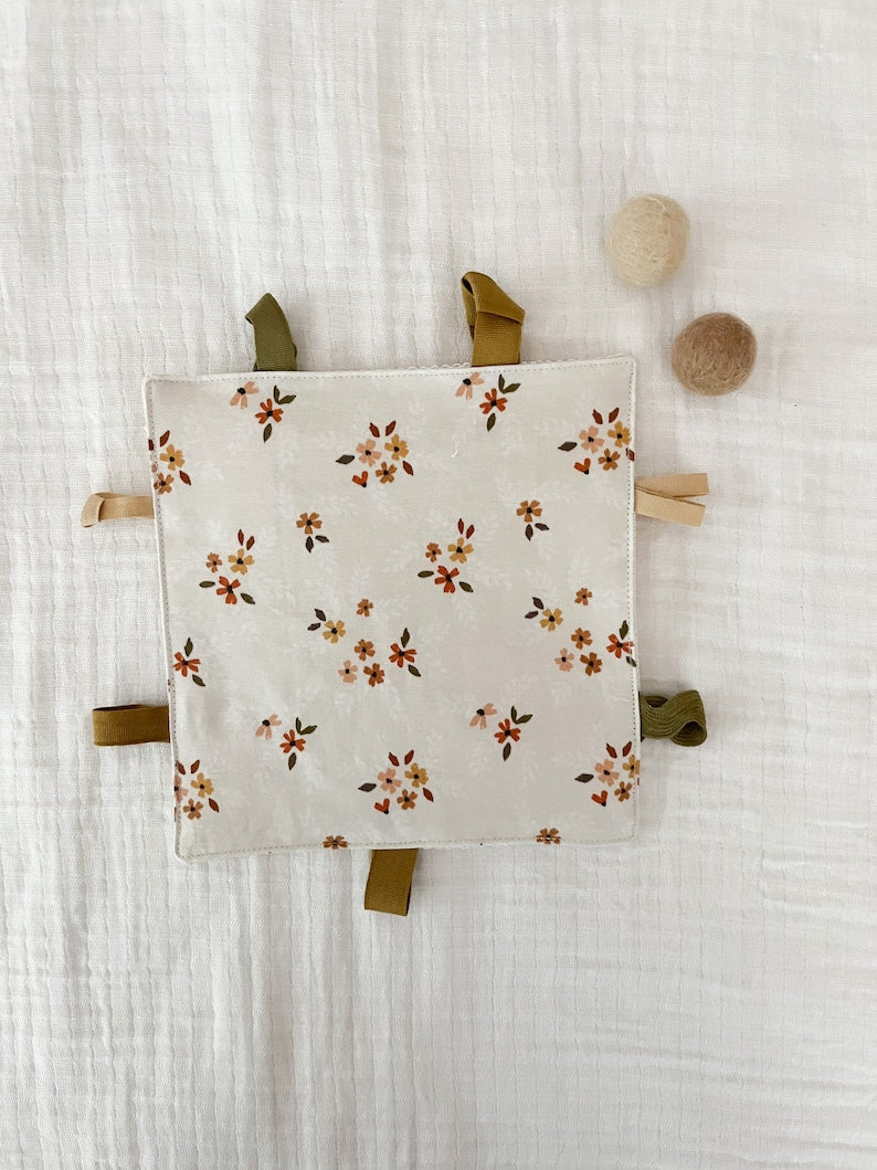 Organic Dainty Floral Baby Ring Lovey