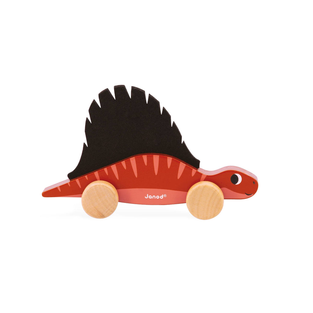 Toy dinosaur with wooden wheels on a white background